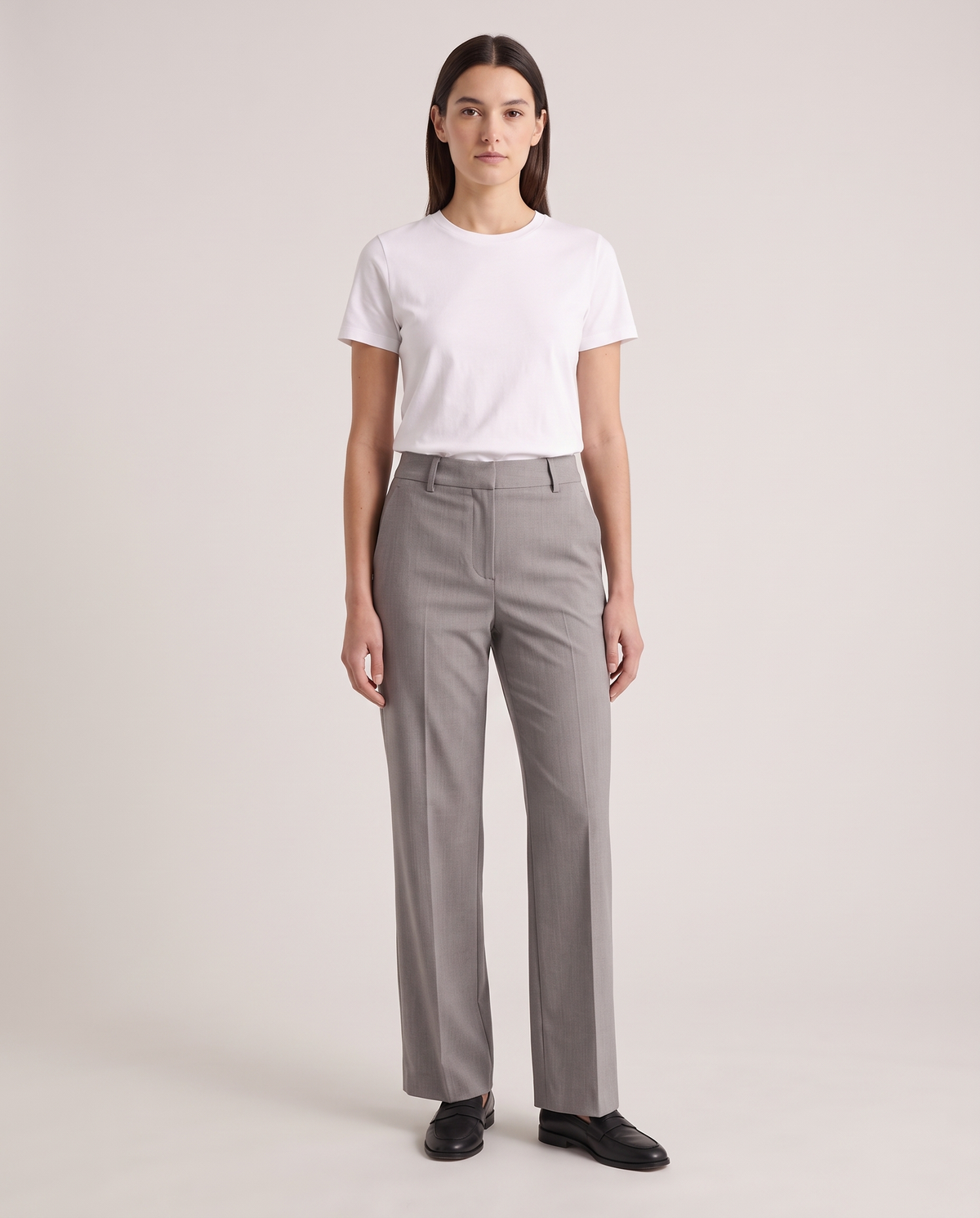 Model wearing the Tailored Trousers in Grey