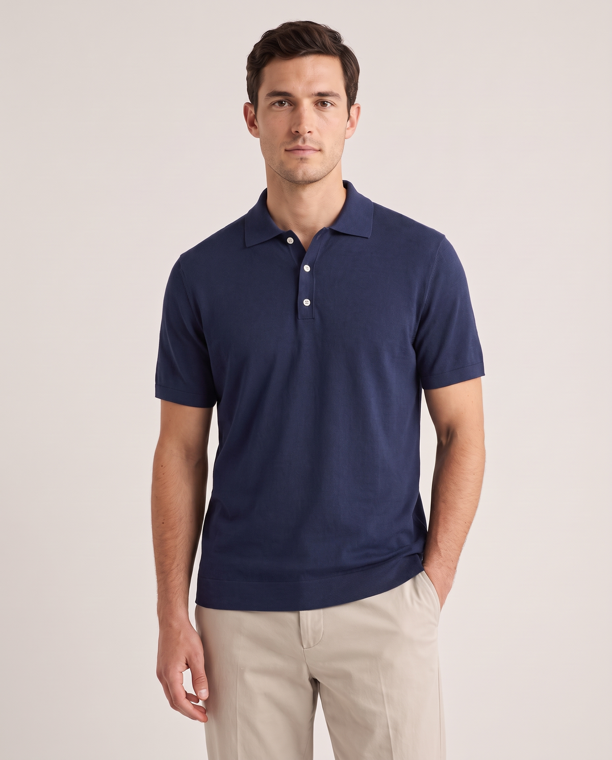 Model wearing the Cotton Polo in Navy