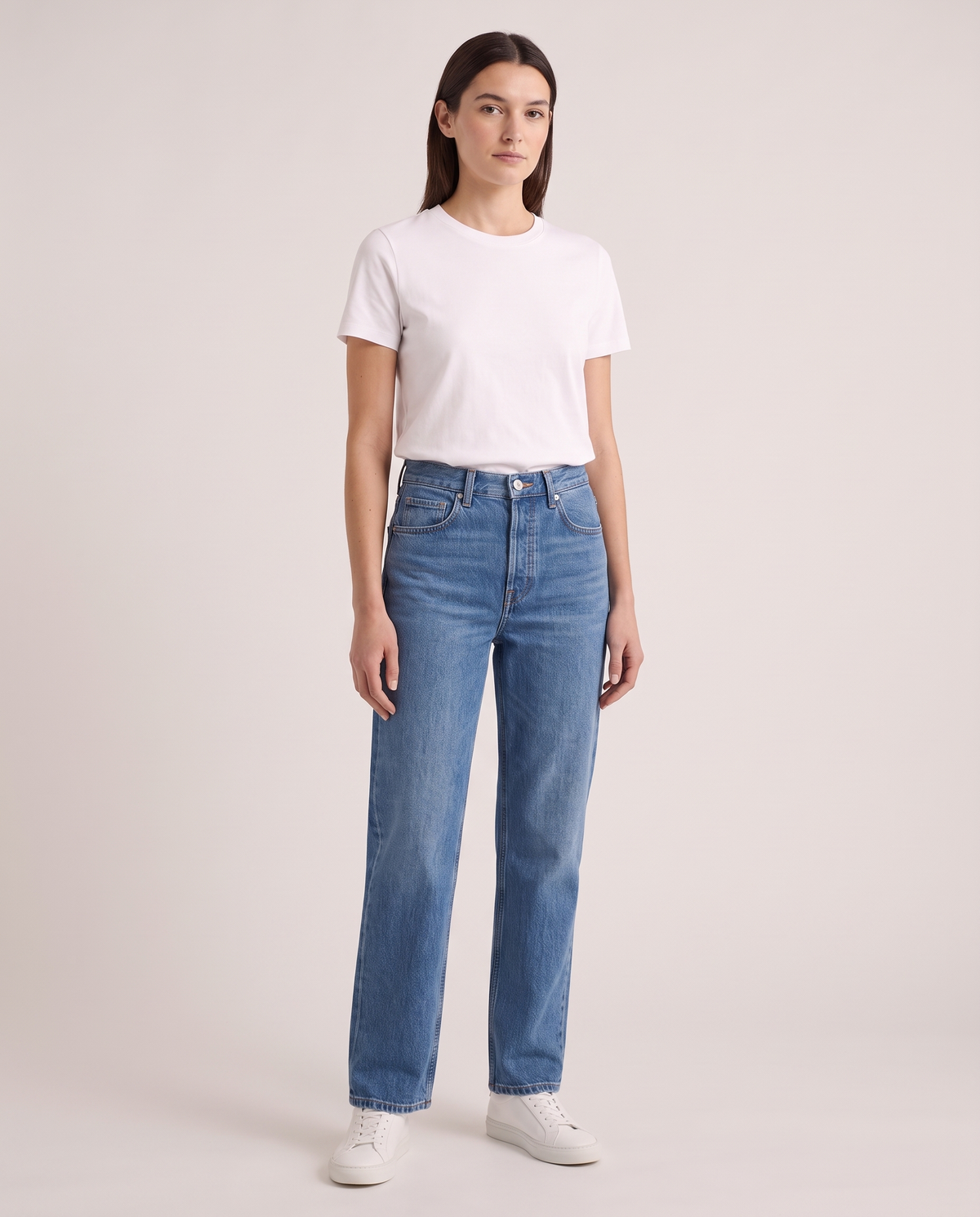 Model wearing the Straight-Leg Jeans in Mid Wash