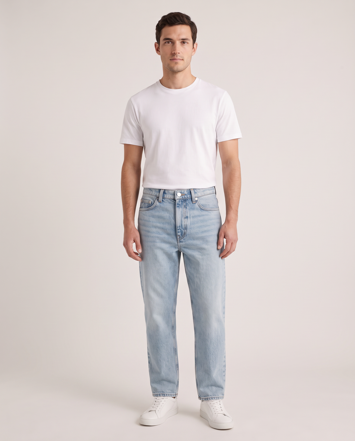 Model wearing the Relaxed Straight Jeans in Light Wash