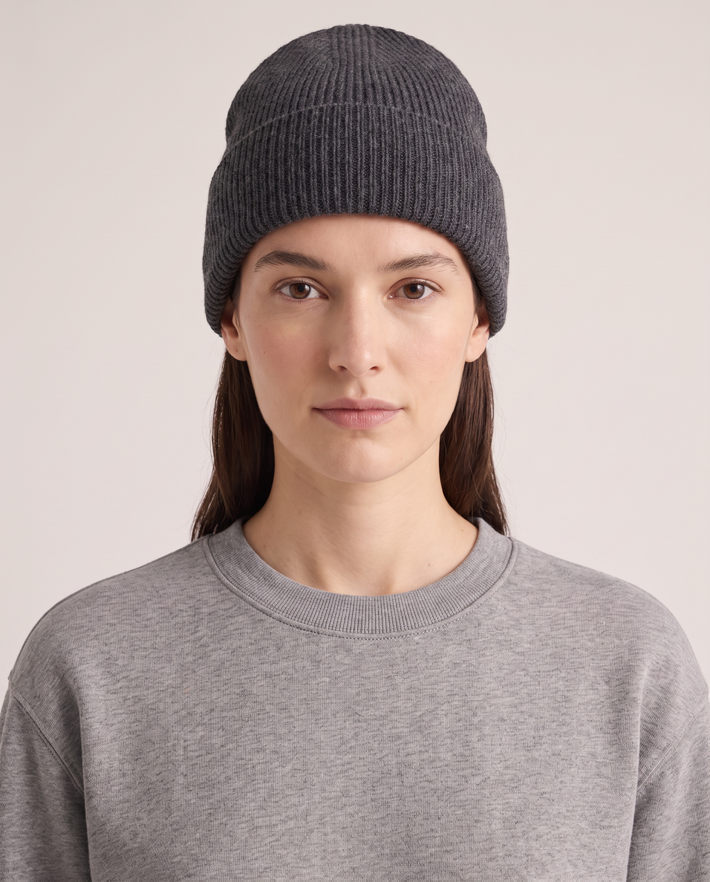 Model wearing the Ribbed Beanie in Charcoal
