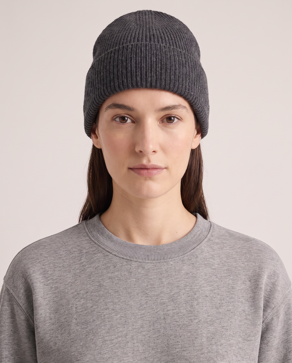 Model wearing the Ribbed Beanie in Charcoal