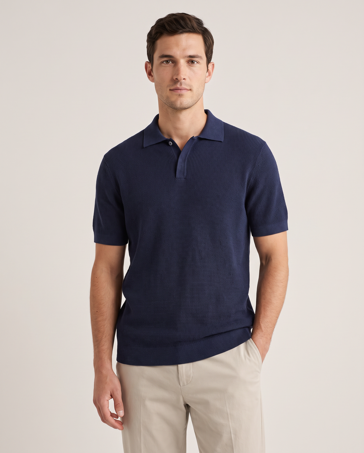 Model wearing the Knitted Polo in Navy